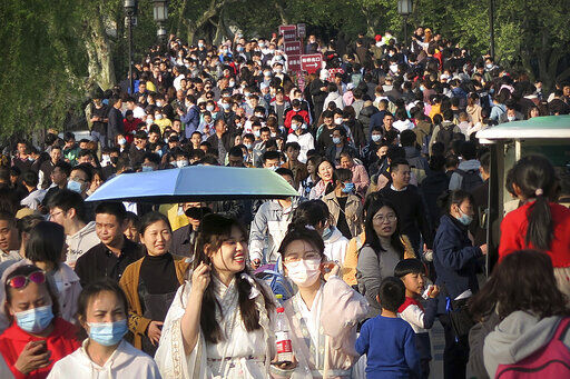 APTOPIX Virus Outbreak China Daily Life